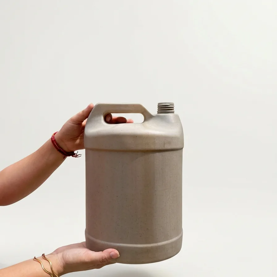 5-litre bamboo biopolymer jerrycan held in hand